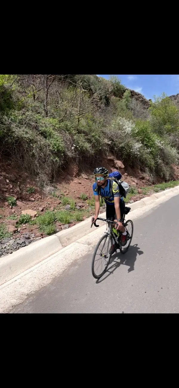 Anas cycling in the mountains near Marrakech